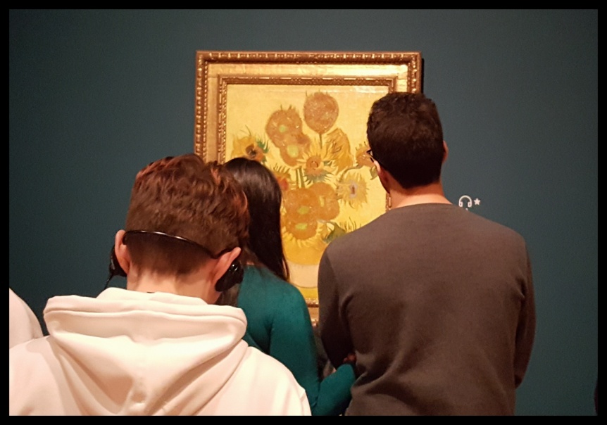 Peeking over the crowds at the Van Gogh Museum.