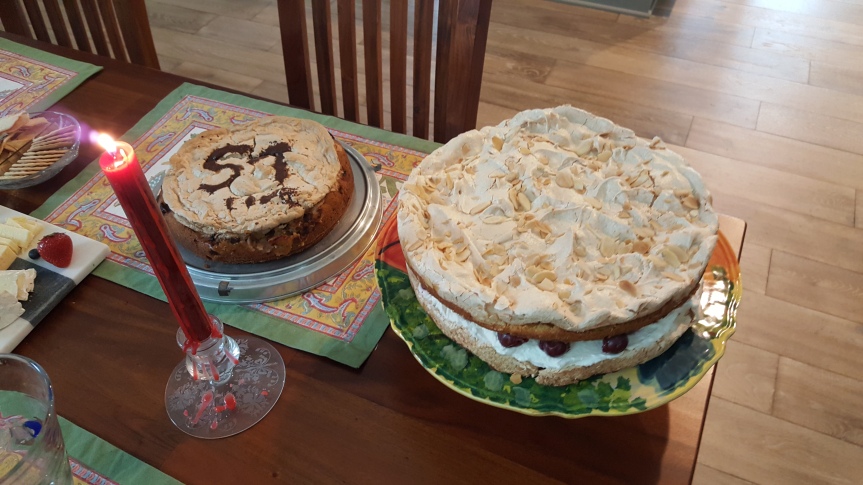 My birthday cakes. on the left a rhubarb cake by Andreas. That's a German one. I'm not 57. On the right a cake by Christina. Both very delicious and German. Christina's cake was her mother's recipe.